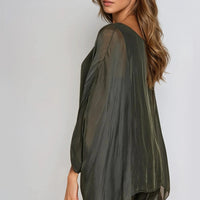 Charcoal silk blouse side view with batwing sleeves and draped silhouette