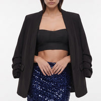 Navy sequin mini skirt with shimmering all-over pattern, front view