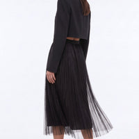 Black mesh midi skirt with faux pearl embellishments, pleated silhouette and sheer overlay