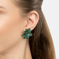 Emerald-green flower stud earrings with textured petals and gold-tone posts