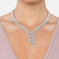 Rhinestone statement necklace with teardrop centerpiece and short fringe drops