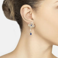 Gold ear-drop earrings with blue teardrop gemstone and small pave accents