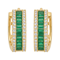 Gold huggie hoop earrings featuring emerald green baguette center and crystal border