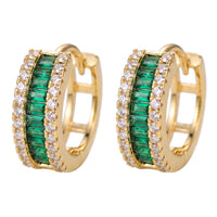Gold huggie hoop earrings with emerald green baguette stones and clear crystal accents