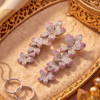 Pink and silver glitter cherry blossom drop earrings, side view