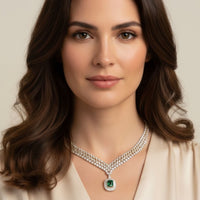 Rhinestone statement necklace with emerald center pendant
