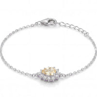 Silver bracelet with yellow topaz and clear stones