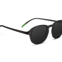 Side view of dark-lens cat-eye sunglasses with black frame and green temple detail