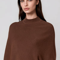Brown high-neck knit jumper with batwing sleeves and relaxed asymmetric hem