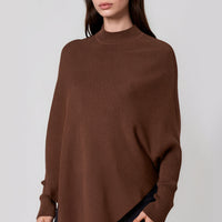 Brown high-neck jumper with batwing sleeves and asymmetric draped hem