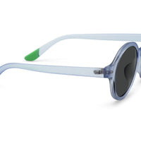 Light blue round sunglasses with dark lenses and green accent near hinge, angled