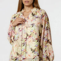 Floral tie-neck blouse with blouson sleeves, light cream with green and pink flowers