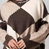 Wool-blend argyle jumper in cream and dark brown with zigzag trim and contrast stitch detail