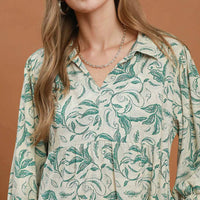 Green botanical print linen midi dress bodice with V-neck and long sleeves