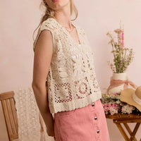 Natural crochet sleeveless vest top with V-neck and button front, patchwork lace details