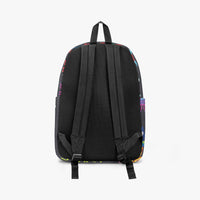 Kids canvas backpack back view with padded mesh straps and adjustable black buckles.