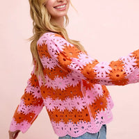 Orange and pink floral crochet top, long sleeves with scalloped crochet trim.