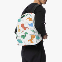 Dinosaur print canvas backpack on person, black straps visible at shoulders