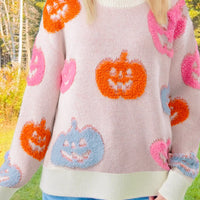Halloween pumpkin pattern sweater with multicolor jack-o'-lanterns and ribbed trim
