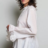 Ivory woven button-down shirt with lace-trim cuffs and pintuck shoulder detail