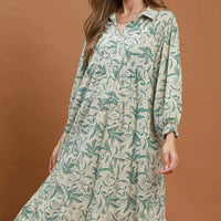Green linen botanical print tiered midi dress with long sleeves and V-neck
