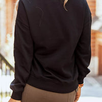 Black Halloween sweatshirt back view, plain crew neck and long sleeves