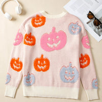 Dusty pink Halloween sweater with fuzzy pumpkin pattern