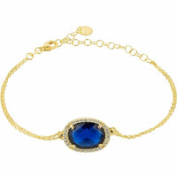Gold chain oval gemstone bracelet with blue center stone