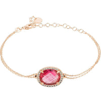 Rose gold oval pink gemstone bracelet with round halo centerpiece