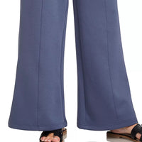 Blue indigo wide-leg center-seam pants with elastic waist, worn with sandals