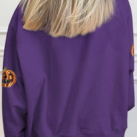 Violet Halloween sweatshirt back with scattered pumpkin sequin details