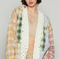 Open-front plaid cardigan with raw-edge trim, yellow blue red patchwork sleeves