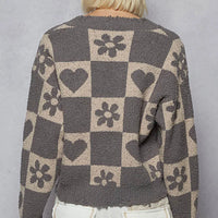 Womenโs back view V-neck heart checkered sweater with long sleeves, gray/beige pattern.