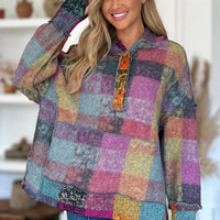 Multicolor plaid fleece hoodie with hood, quarter-zip placket, and dropped shoulders