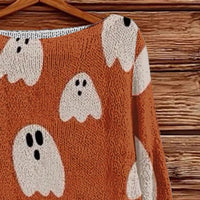 Plus-size orange Halloween boat-neck sweater with large ghost and pumpkin pattern detail