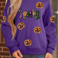 Violet sequin Halloween sweatshirt featuring 'Spooky' text and jack-o'-lantern sequins