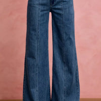 Mid-rise stretch denim jeans with center seam detail, wide flared legs