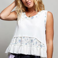 Off-white ribbed tank top with floral yoke and double ruffle hem