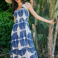 Sleeveless smocked bodice tiered midi dress with navy abstract print, lined