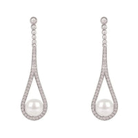 Silver drop earrings with cradled pearl teardrop frames and rhinestone borders