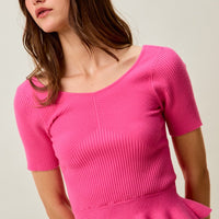 Hot pink ribbed knit short-sleeve sweater top with peplum hem detail