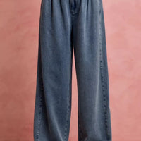 Denim wide-leg jeans with ruffled elastic waistband, button front, and patch pockets