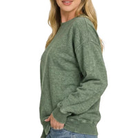 Women's army green fleece crewneck sweatshirt, long sleeves, ribbed cuffs, side profile