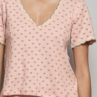 Soft pink floral V-neck T-shirt with lace-trim V neckline and short sleeves