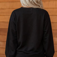Black long-sleeve crewneck sweatshirt, plain back view
