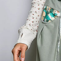 Ivory ribbed knit long sleeve top with tiny floral print and textured cuff