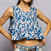 Navy floral cropped pintuck tank with round neckline and sleeveless design