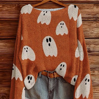 Plus-size Halloween boat-neck sweater in orange with ghost faces and pumpkin graphics
