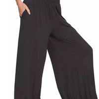 Black smocked-waist wide-leg palazzo pants with flowing relaxed drape