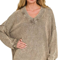 Brown washed oversized sweater with deep V-neck and ribbed knit cuffs